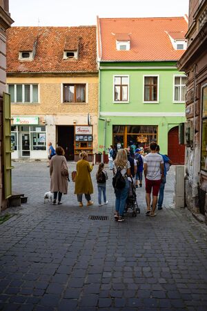 Brasov, Romania - 2019. People wandering on the streets of Brasov old town.のeditorial素材