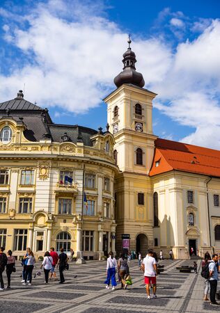 Sibiu, Romania - 2019. Tourists wandering in The Big Square of Sibiu (Piata Mare).のeditorial素材