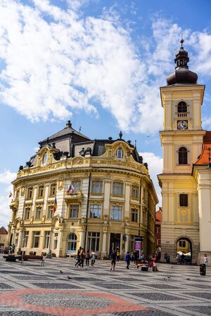 Sibiu, Romania - 2019. Tourists wandering in The Big Square of Sibiu (Piata Mare).のeditorial素材