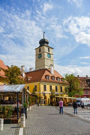 Sibiu, Romania - 2019. People wandering on the street of Sibiu near the Council Tower (Turnul Sfatului).のeditorial素材
