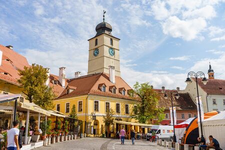 Sibiu, Romania - 2019. People wandering on the street of Sibiu near the Council Tower (Turnul Sfatului).のeditorial素材