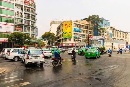 Ho Chi Minh City, Vietnam â 2019. Motorbike traffic in motion on the streets of the downtown area of Ho Chi Minh.のeditorial素材