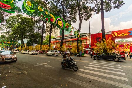 Ho Chi Minh City, Vietnam â 2019. Motorbike traffic in motion on the streets of the downtown area of Ho Chi Minh.のeditorial素材