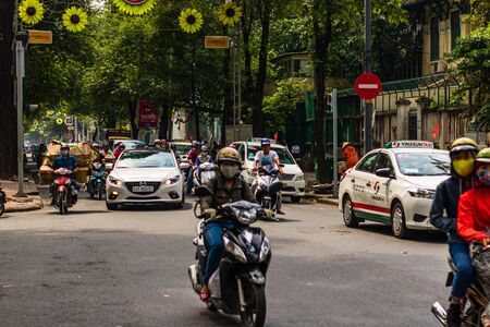Ho Chi Minh City, Vietnam â 2019. Motorbike traffic in motion on the streets of the downtown area of Ho Chi Minh.のeditorial素材
