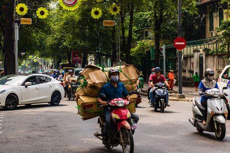 Ho Chi Minh City, Vietnam â 2019. Motorbike traffic in motion on the streets of the downtown area of Ho Chi Minh.のeditorial素材