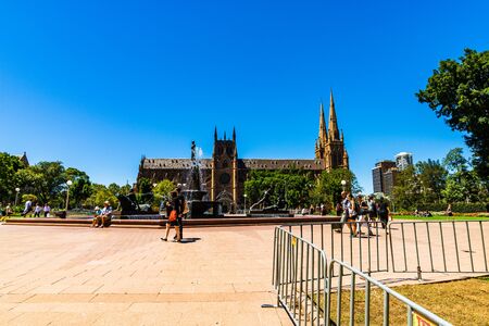 Sydney, Australia - 2019. Archibald Memorial Fountain in Hyde Park, Theseus conquering the Minotaur & Cathedral.のeditorial素材