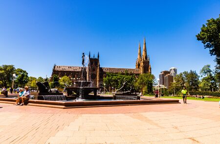 Sydney, Australia - 2019. Archibald Memorial Fountain in Hyde Park, Theseus conquering the Minotaur & Cathedral.のeditorial素材