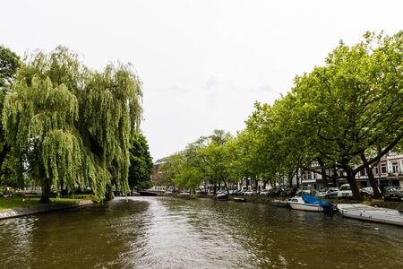 Amesterdam, Holland  2019. Amsterdam Houseboats on the banks of the Amstel River.のeditorial素材