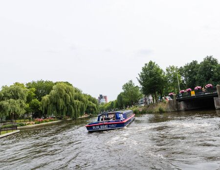 Amesterdam, Holland  2019. Boat trip on the Amstel river in Amsterdam.のeditorial素材