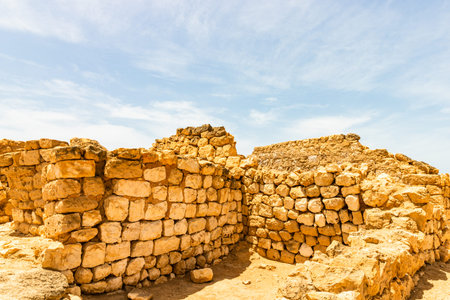 Castle of Sumhuram in Salalah, Sultanate of Oman. Stone walls in the archaeological site near...