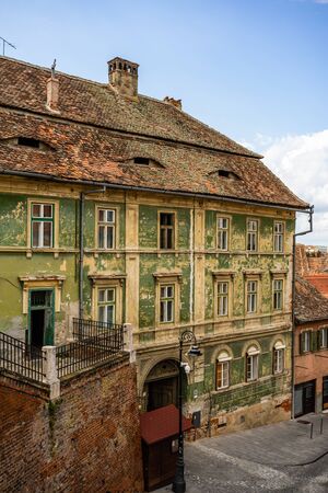 Medieval house with old stone walls and old paint.の写真素材