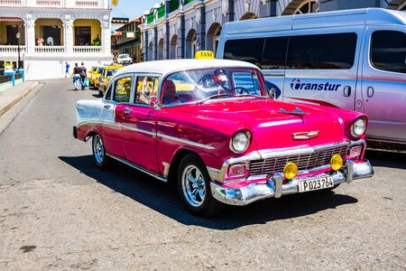 Santiago de Cuba, Cuba â 2019. Car traffic in front of the Cathedral of Santiago de Cuba from the Parque Cespedes.のeditorial素材