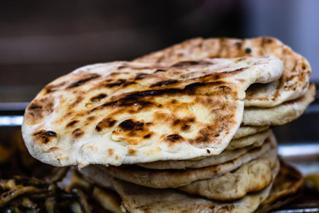 Pita bread on the grill during fast food festival, street food