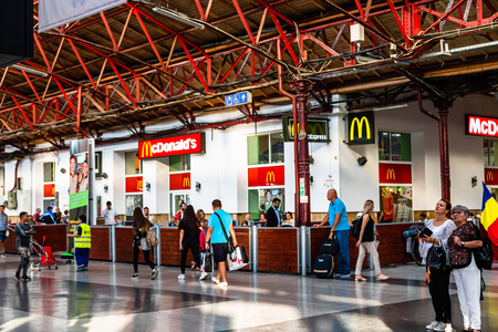 Travelers at main railway station in Bucharest, the North Railway Station (Gara de Nord) in Bucharest, Romania, 2019のeditorial素材