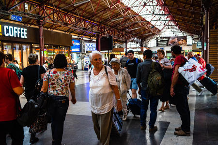Travelers at main railway station in Bucharest, the North Railway Station (Gara de Nord) in Bucharest, Romania, 2019のeditorial素材