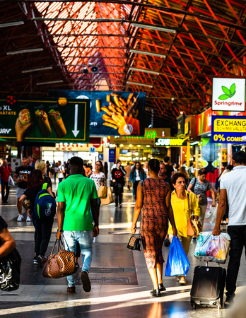 Travelers at main railway station in Bucharest, the North Railway Station (Gara de Nord) in Bucharest, Romania, 2019のeditorial素材