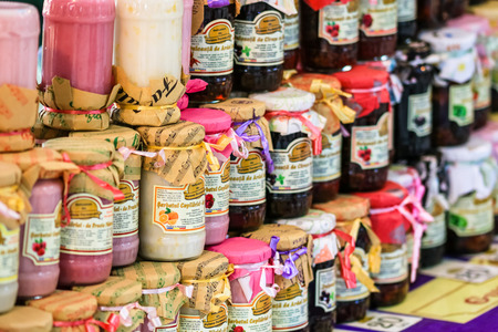Homemade jars of jam for sale at a food festival in Bucharest, Romania â 2019のeditorial素材