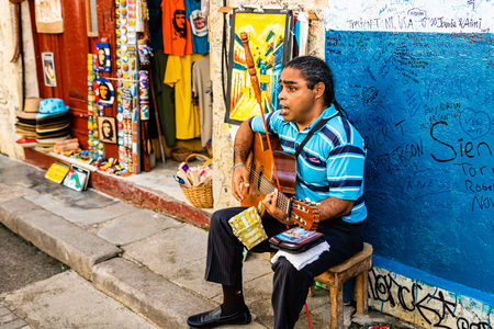 Havana, Cuba â 2019. Street musician playing traditional Cuban music on the street of Havana.のeditorial素材