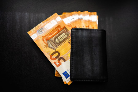 Man wallet with money on the table, wallet with EUROの写真素材