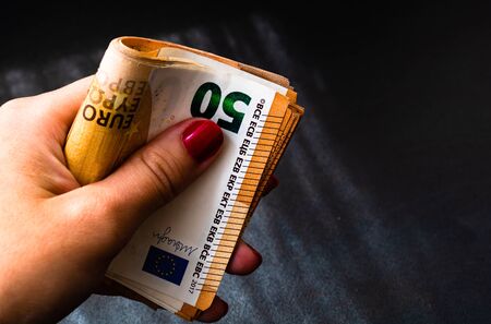 Woman counting money, counting EURO close upの写真素材