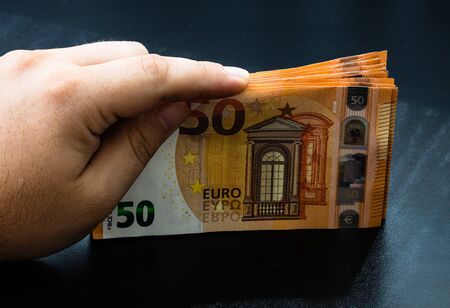 Man counting money, counting EURO close upの写真素材