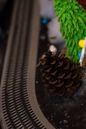 Christmas decorations against blurred background. Photo of a pinecone,の写真素材