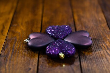 Christmas decorations on wooden board. Christmas concept. Colorful and glittery Christmas balls.の写真素材