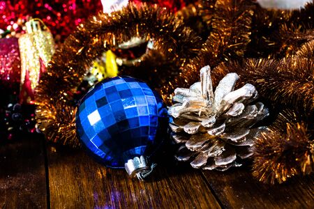 Christmas decorations on wooden board. Christmas concept. Colorful Christmas balls.の写真素材