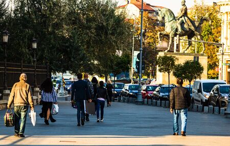 People, tourists walking on the sidewalk in downtown Bucharest, Romania, 2019のeditorial素材