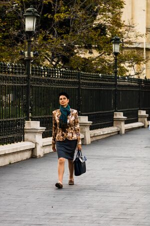 People, tourists walking on the sidewalk in downtown Bucharest, Romania, 2019のeditorial素材