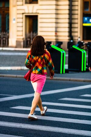 People, tourist crossing the street in downtown Bucharest, Romania, 2019のeditorial素材