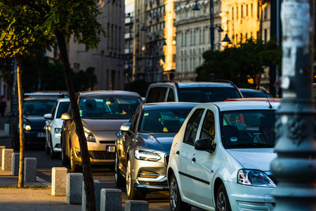 Car traffic at rush hour in downtown area, Victoriei Boulevard (Calea Victoriei) in Bucharest,...
