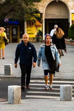 People, tourists walking on the sidewalk in downtown Bucharest, Romania, 2019のeditorial素材