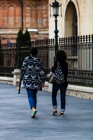 People, tourists walking on the sidewalk in downtown Bucharest, Romania, 2019のeditorial素材