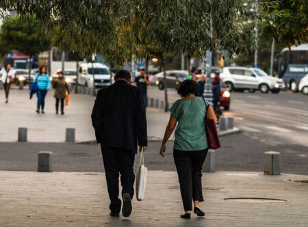 People, tourists walking on the sidewalk in downtown Bucharest, Romania, 2019のeditorial素材