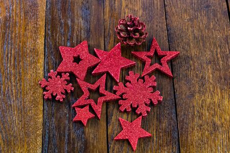 Colorful, glittery and shiny Christmas decorations on wooden board. Christmas concept. Christmas background.の写真素材
