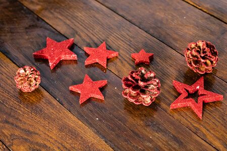 Colorful, glittery and shiny Christmas decorations on wooden board. Christmas concept. Christmas background.の写真素材