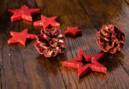 Colorful, glittery and shiny Christmas decorations on wooden board. Christmas concept. Christmas background.の写真素材