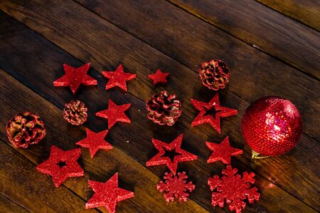 Colorful, glittery and shiny Christmas decorations on wooden board. Christmas concept. Christmas background.の写真素材