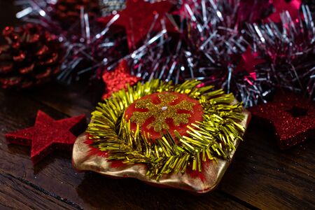 Christmas decorations on wooden board. Christmas concept. Colorful Christmas candle.の写真素材