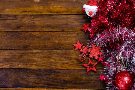 Colorful, glittery and shiny Christmas decorations on wooden board. Christmas concept. Christmas background.の写真素材