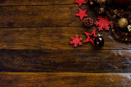 Colorful, glittery and shiny Christmas decorations on wooden board. Christmas concept. Christmas background.の写真素材