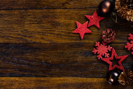Colorful, glittery and shiny Christmas decorations on wooden board. Christmas concept. Christmas background.の写真素材