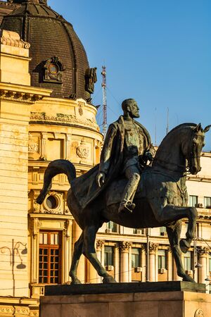 Calea Victoriei, The National Library and the equestrian statue of Carol I in Bucharest, Romania, 2019のeditorial素材