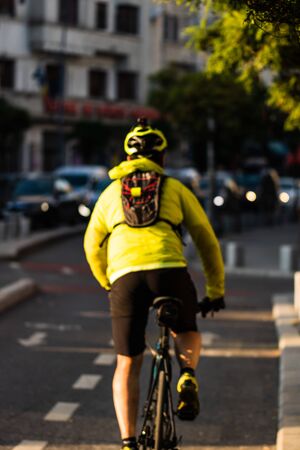 Young man on a bicycle on the streets of Bucharest, Romania, 2019のeditorial素材