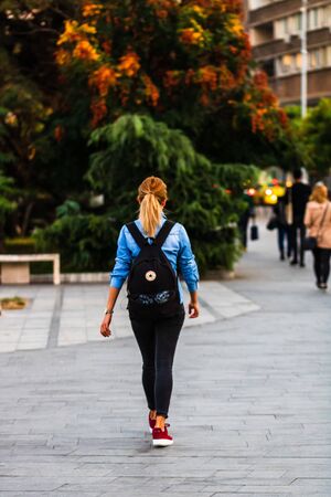 Tourists walking on the sidewalk of Victoriei Way (Calea Victoriei) in Bucharest, Romania, 2019のeditorial素材