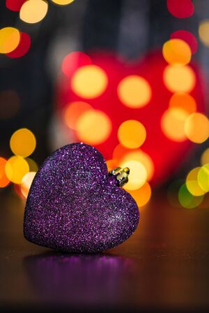 Christmas decoration and ornaments. Christmas composition on blurred lights background. Shiny Christmas ball.の写真素材