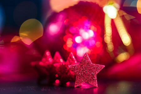 Christmas decoration and ornaments. Christmas composition on blurred lights backgroundの写真素材