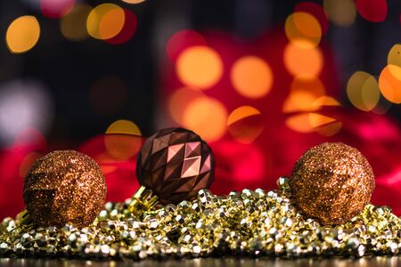 Christmas decoration and ornaments. Christmas composition on blurred lights background. Christmas balls.の写真素材