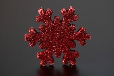 Christmas decoration and ornaments.  Christmas background.  Christmas balls. REd and glittery snowflake.の写真素材